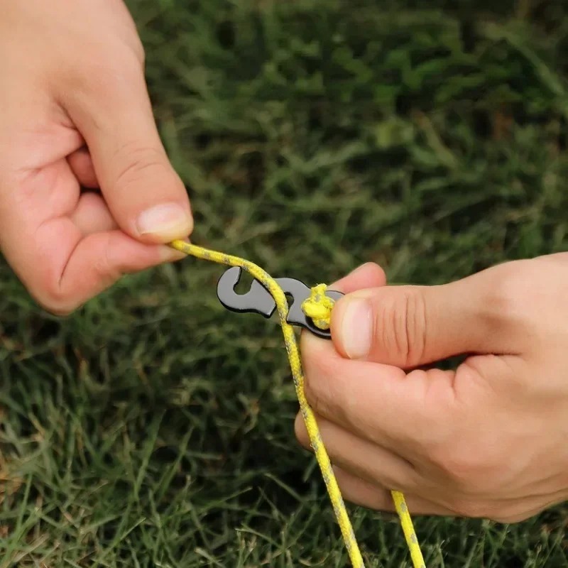 مشد حبل خيمة ثلاثي العيون على  - مراجعة Outdoor Camping Extension Cord وسعره